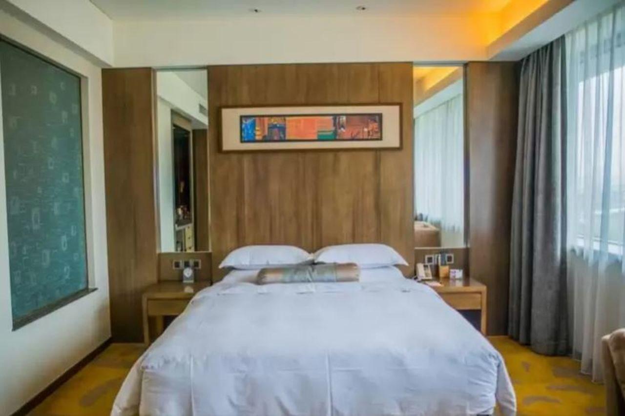 Gleetour Maya Hotel Ухань Экстерьер фото