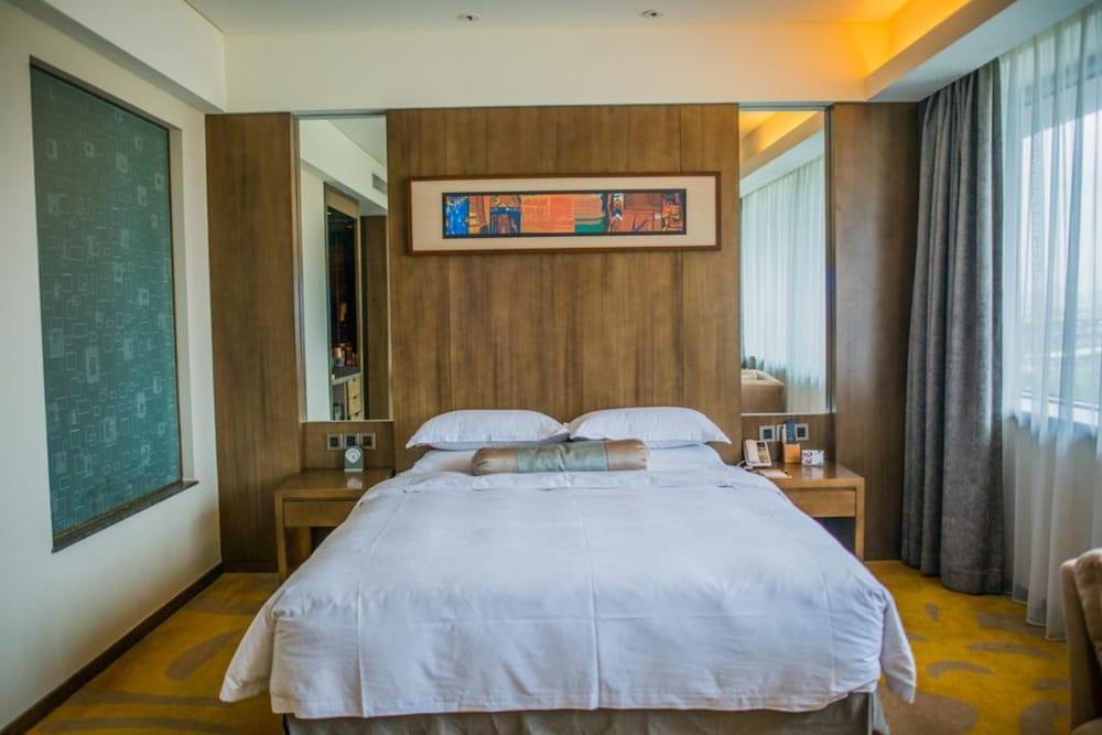 Gleetour Maya Hotel Ухань Экстерьер фото