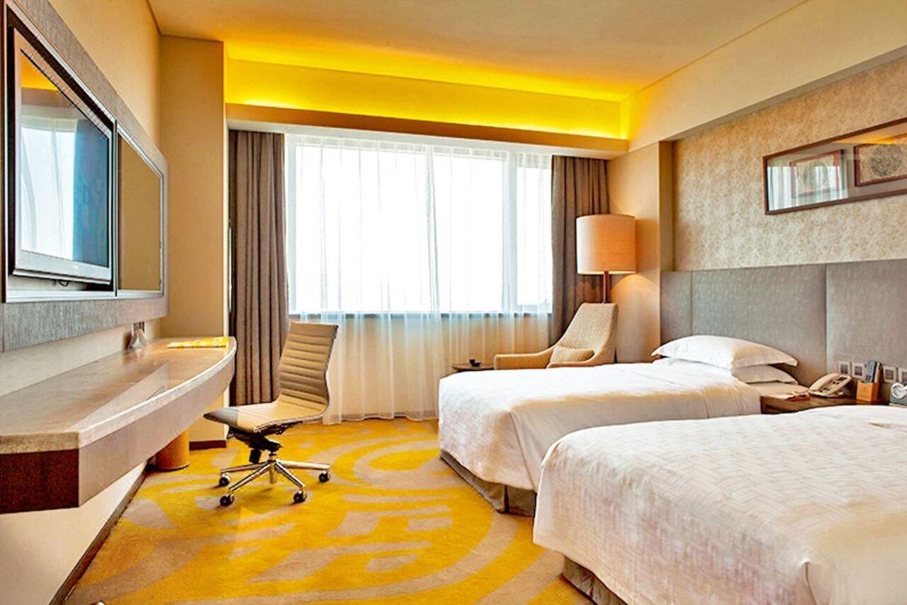 Gleetour Maya Hotel Ухань Экстерьер фото